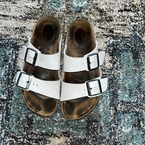 Size 38 white Birkenstocks would fit a women’s size 7 to 7.5